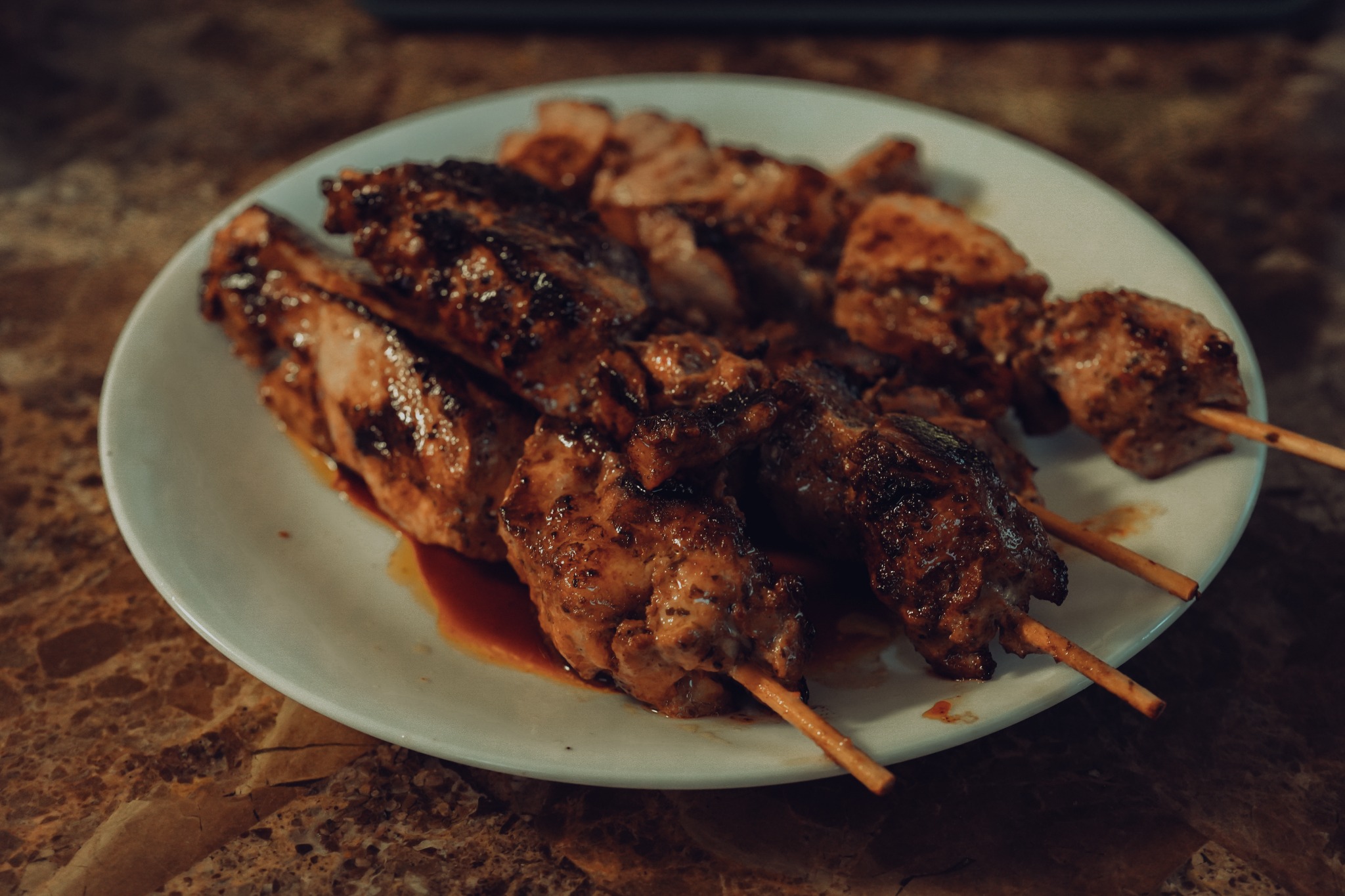 Grilled Filipino barbecue served on a plate